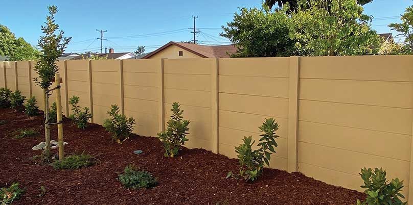 Yellow smoothstone precast concrete wall