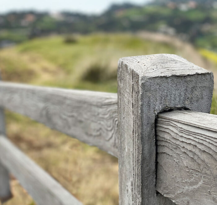 Gray woodcrete precast concrete fence