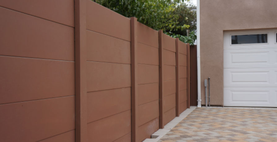 Brown smoothstone precast concrete wall