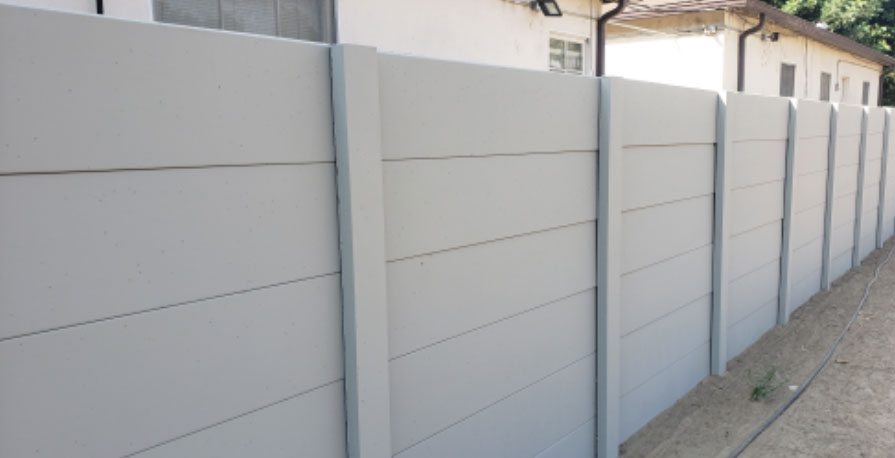 White smoothstone precast concrete wall