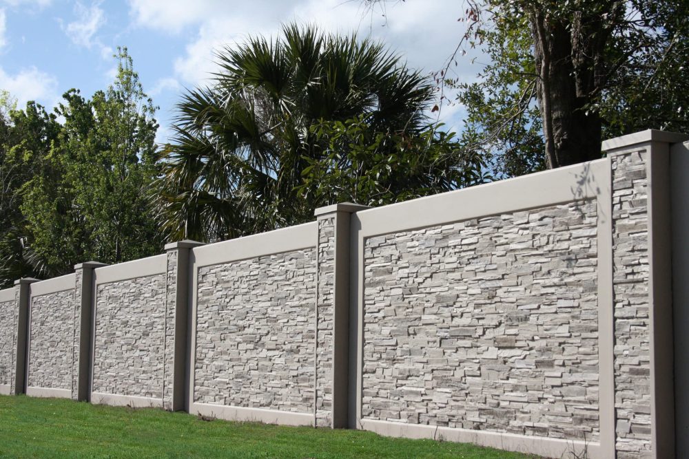 Precast concrete perimeter wall around commercial building.